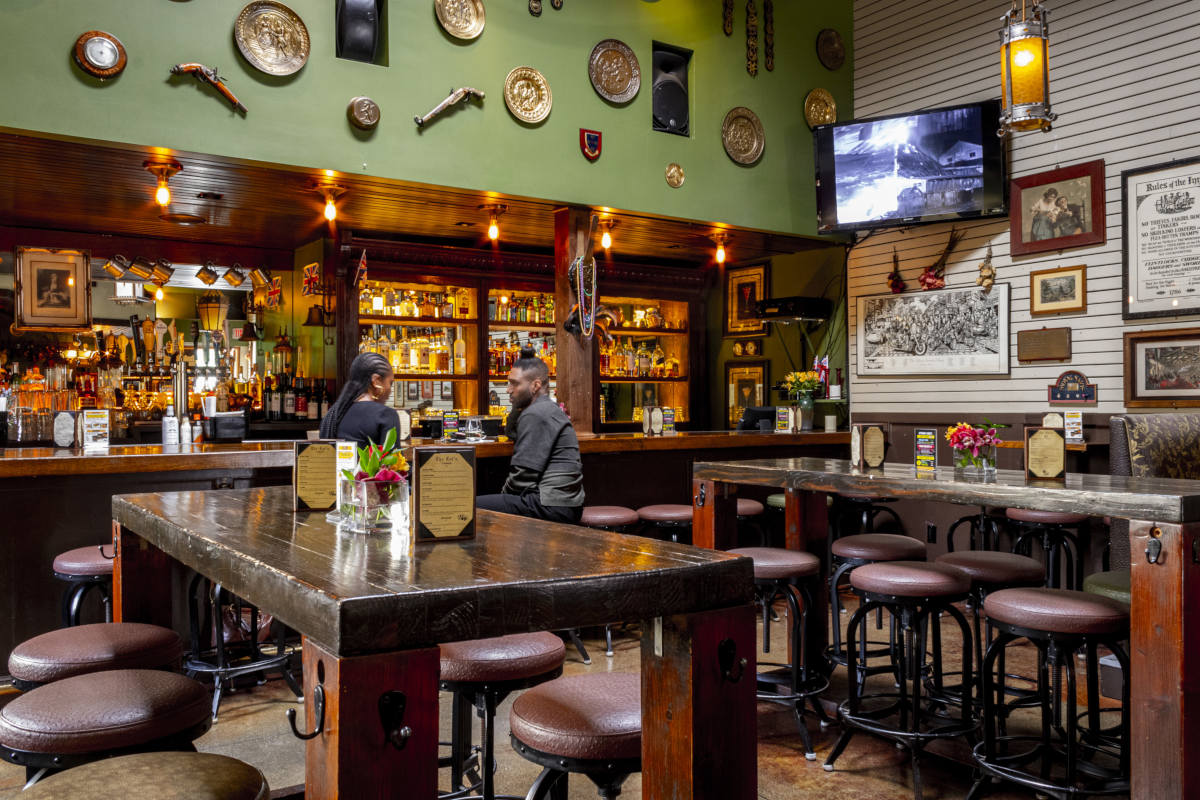 Interior, tables for six, bar area in the back